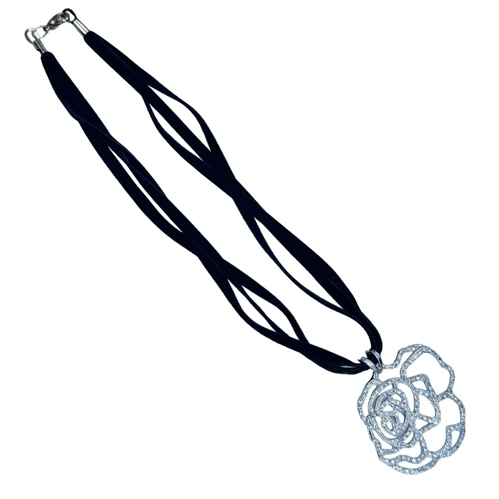 STERLING SILVER OPEN FLOWER PENDANT W MICRO PAVE STONES ON BLACK SUEDE NECKLACE
